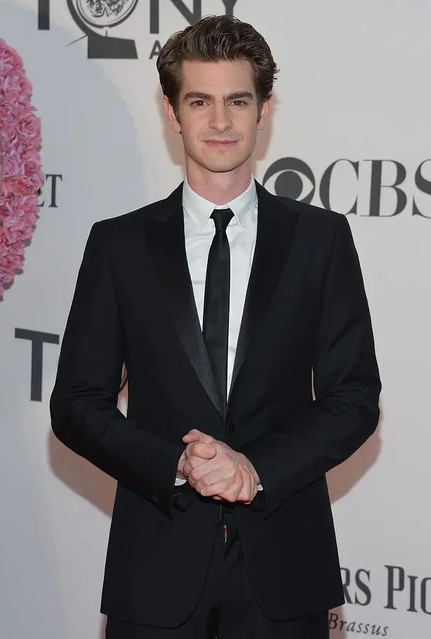 Andrew Garfield smiling at an awards ceremony